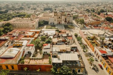 Stunning aerial view of Oaxaca city featuring historic architecture and vibrant streets.