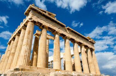 Iconic Parthenon in Athens under a clear blue sky.