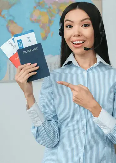 Friendly travel agents assisting clients with bookings and travel planning, representing Odit International Travel & Tourism’s personalized service.